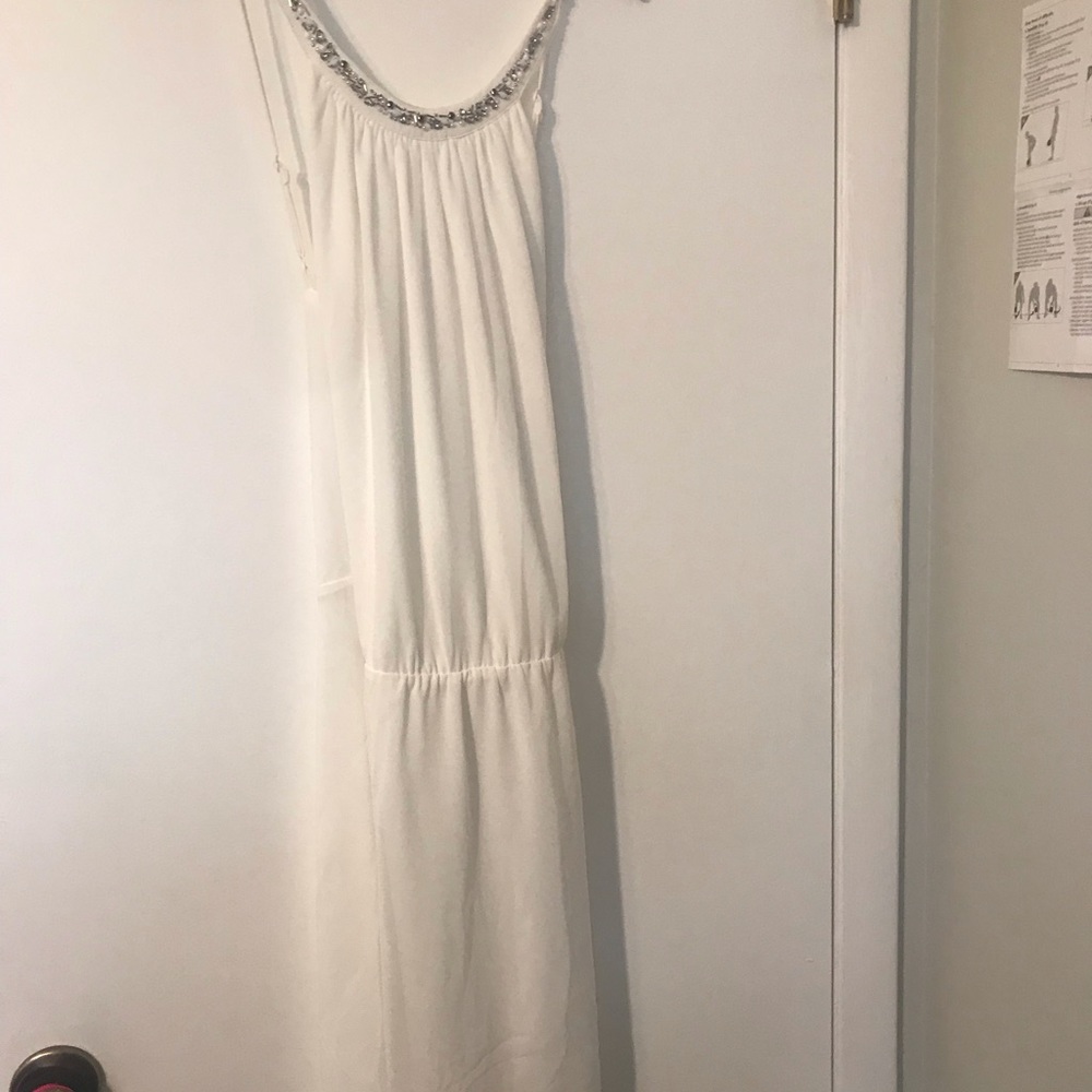 White dress perfect for bridal shower or bachelorette party.